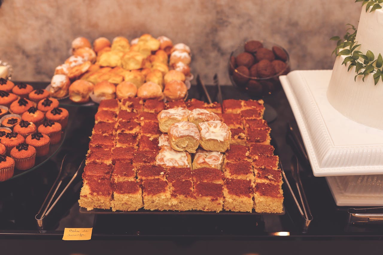 about-04 An elegant display of assorted pastries on a table, perfect for events.